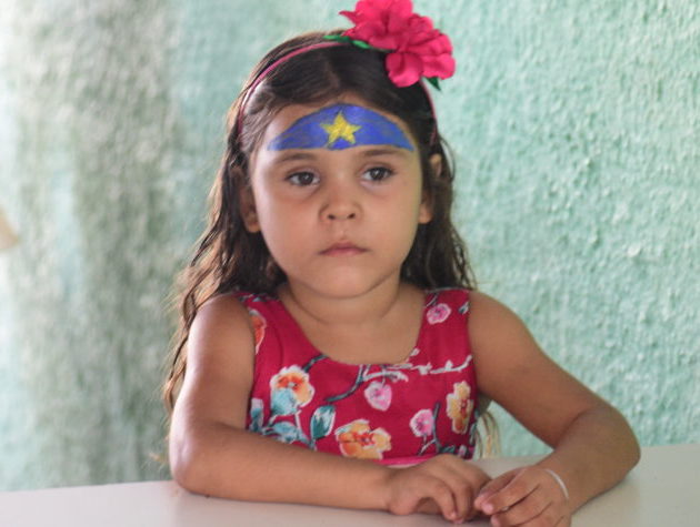 Young Girl with Wonder Woman Face Painting