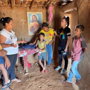 Deborah Rock Talking Praying with Locals